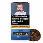 Tutun pentru pipa Stanwell Classic 50g – ambalaj albastru cu avertisment grafic și prezentare produs pe fundal alb